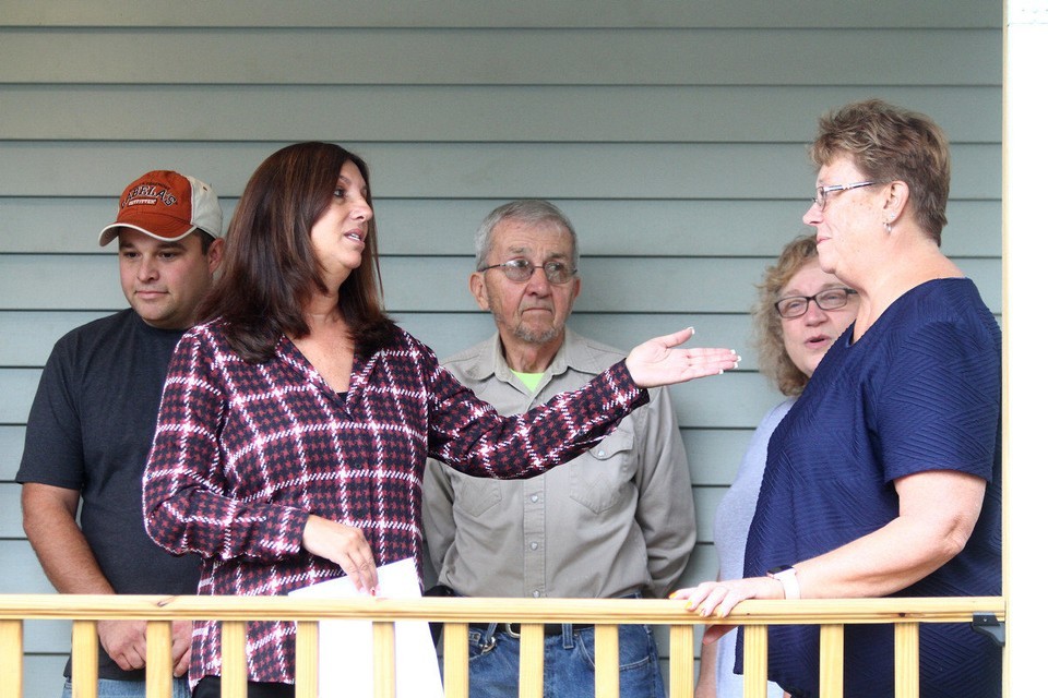 People standing on porch
